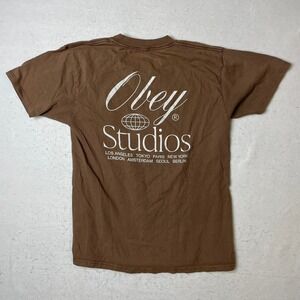 Obey Studios Graphic T Shirt Mens Medium Brown Short Sleeve Crew Neck Tee